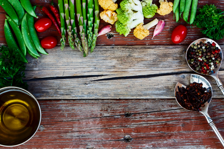 Vegetables. Fresh Bio Vegetable Over wooden Background. Top view.の写真素材