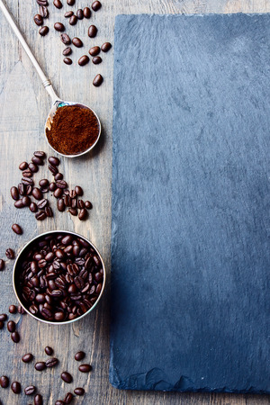 Top view of Coffee on grunge dark background.の写真素材