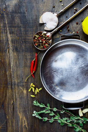 Herbs and spices selection on dark wooden background. Top view.の写真素材