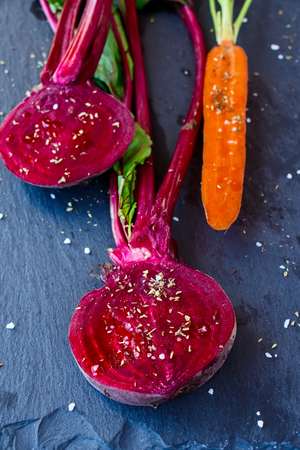 Raw vegetables for roasting on a baking tray, selective focusの写真素材
