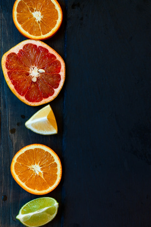Set of sliced citrus fruits lemon, lime, orange, grapefruit with copy space.Top viewの写真素材