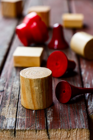 colorful wooden cubes on wooden texture, selective focusの写真素材