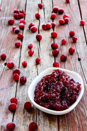 Cranberry sauce in white bowl. Selective focus.の写真素材