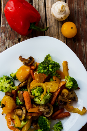 Top view of Grilled vegetables on rustic wooden background.の写真素材