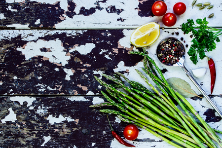 Organic Vegetables and spices - vintage spoon and old wooden background - cooking, healthy eating. Food concept. Top view.の写真素材