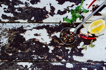 Herbs and spices selection - vintage spoon and old wooden background - cooking, healthy eating. Food concept. Top view.の写真素材