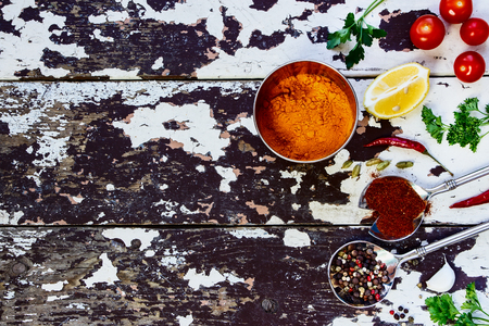 Spices and herbs selection - vintage spoons and old wooden background - cooking, healthy eating. Food concept. Top view.の写真素材