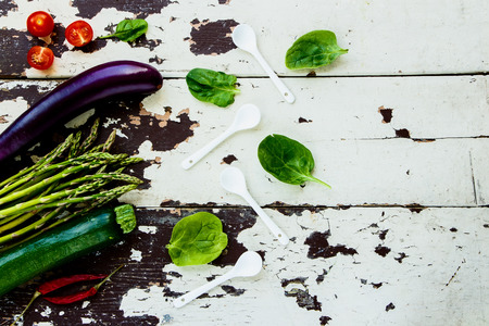 Aromatic Herbs and ingredients on old wooden background.の写真素材