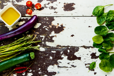 Ingredients, spices and herbs over rustic wooden background.の写真素材