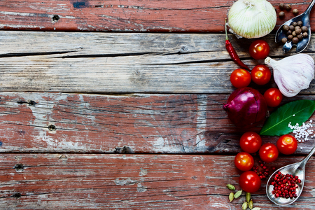 Vegetables, spices and herbs on rustic wooden background. Top view.の写真素材