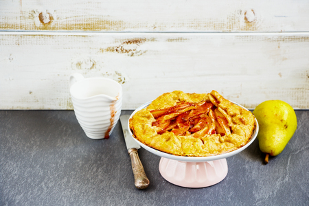 Pear pie or tart with raspberry jam. Seasonal Fall or Autumn dessertの写真素材