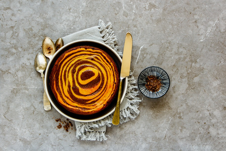 Cottage cheese cake with chocolate over vintage background flat lay top viewの写真素材