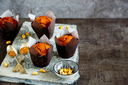 Homemade peanut butter muffins on stone board close upの写真素材