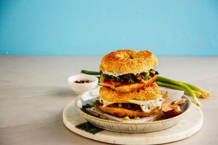 Tasty hot mushrooms and fried egg sandwich on blue backgroundの写真素材
