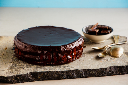 Dark chocolate cake on stone board close upの写真素材