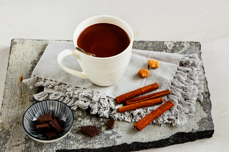 Hot chocolate with spices and ingredients close up. Winter drink.の写真素材