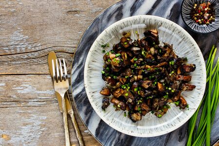 Roasted mushrooms in plate close upの写真素材