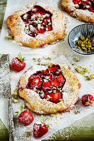 Strawberry sweet summer pie with pistachios close upの写真素材