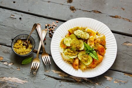 Homemade roast young potato salad with egg and cucumberの写真素材