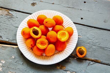 Fresh apricot fruit on wooden table. Local farmers produceの写真素材