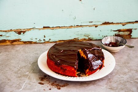 Chocolate and pumpkin cake garnished with chocolate, slicedの写真素材