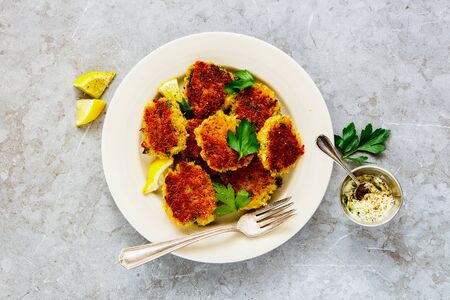 Homemade vegetable pancakes on light background top viewの写真素材