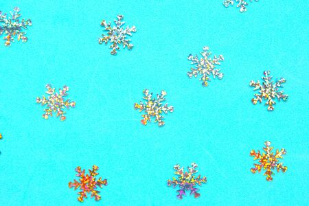 Decorative snoflakes on blue background. Christmas abstract patternの写真素材