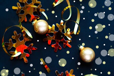 Christmas abstract background with golden decorations and snowflakesの写真素材