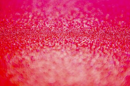 Red glitter background texture, defocusedの写真素材