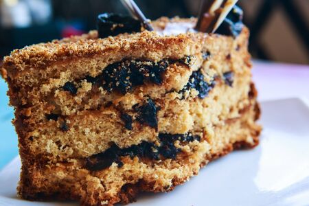 Sliced tasty chocolate cake, closeupの写真素材