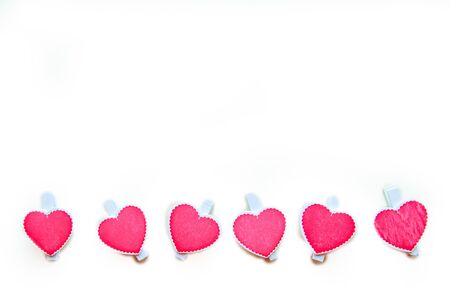 Red hearts on white background. Flat lay, top view, copy space. Valentine's Day greeting cardの写真素材