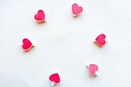 Red hearts on white background. Flat lay, top view, copy space. Valentine's Day greeting cardの写真素材