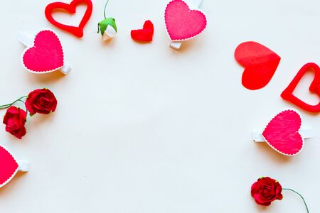 Round frame of hearts on white background, flat lay, top view, copy space. Valentine's day greeting cardの写真素材