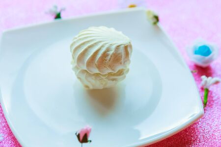 White vanilla zefir on white plate, closeupの写真素材