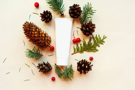  Cosmetic bottle, cones and spruce branches on white background, top view. Natural cosmetic products conceptの写真素材
