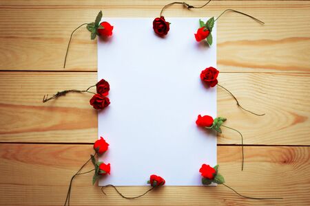 Women's Day mockup greeting card with decorative flowers on wooden backgroundの写真素材