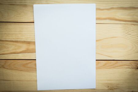 White mockup blank on wooden background, flatlayの写真素材