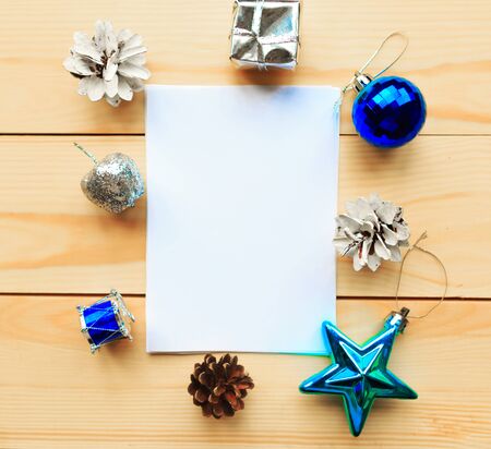 Christmas or New Year mockup greeting card on wooden backgroundの写真素材