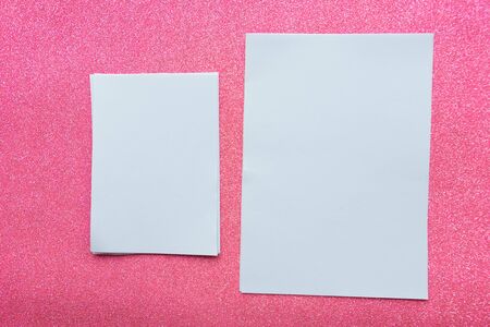 Two white mockup blanks on glitter pink backgroundの写真素材