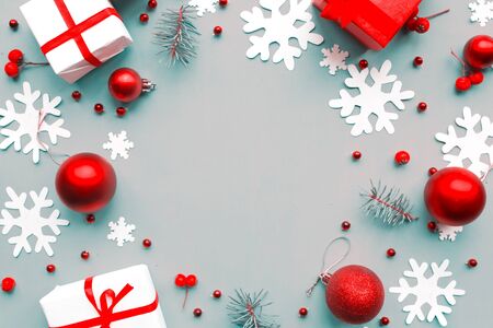Merry Christmas and Happy New Year. Flat lay photo with Christmas decorations on blue background. Xmas greeting card, banner. Copy space for the textの写真素材
