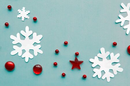 Merry Christmas and Happy New Year. Flat lay photo with Christmas decorations on blue background. Xmas greeting card, banner. Copy space for the textの写真素材