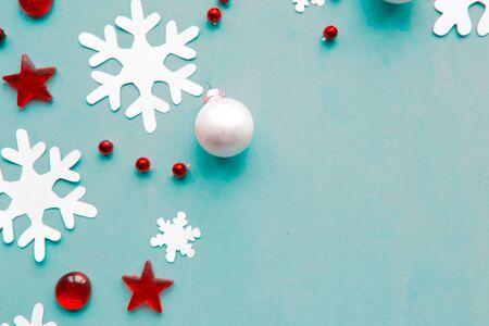 Merry Christmas and Happy New Year. Flat lay photo with Christmas decorations on blue background. Xmas greeting card, banner. Copy space for the textの写真素材