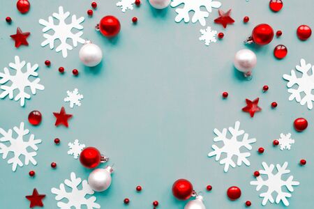 Merry Christmas and Happy New Year. Flat lay photo with Christmas decorations on blue background. Xmas greeting card, banner. Copy space for the textの写真素材