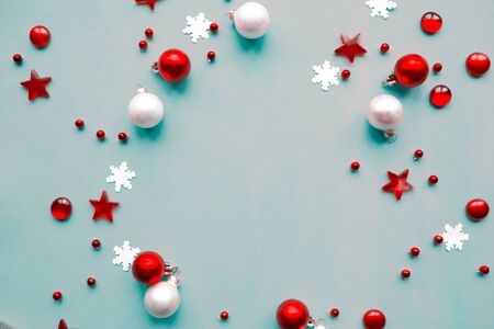 Merry Christmas and Happy New Year. Flat lay photo with Christmas decorations on blue background. Xmas greeting card, banner. Copy space for the textの写真素材