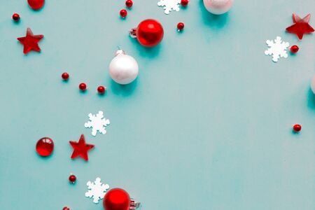 Merry Christmas and Happy New Year. Flat lay photo with Christmas decorations on blue background. Xmas greeting card, banner. Copy space for the textの写真素材