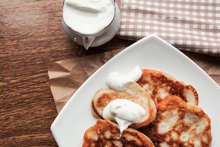 Sweet homemade pancakes and tea cup, flat lay, top viewの写真素材