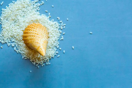 Raw white rice in waffle cone. Flat lay, top view, copy space, minimal