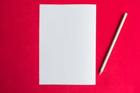 White mockup blank and pencil on red background