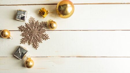Christmas decorations on old white wooden background. Flat lay, top view, copy space. Merry Christmas and Happy New Yearの写真素材