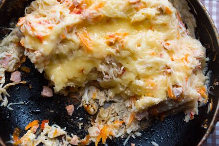 fried noodles with in a pan close-up.の写真素材